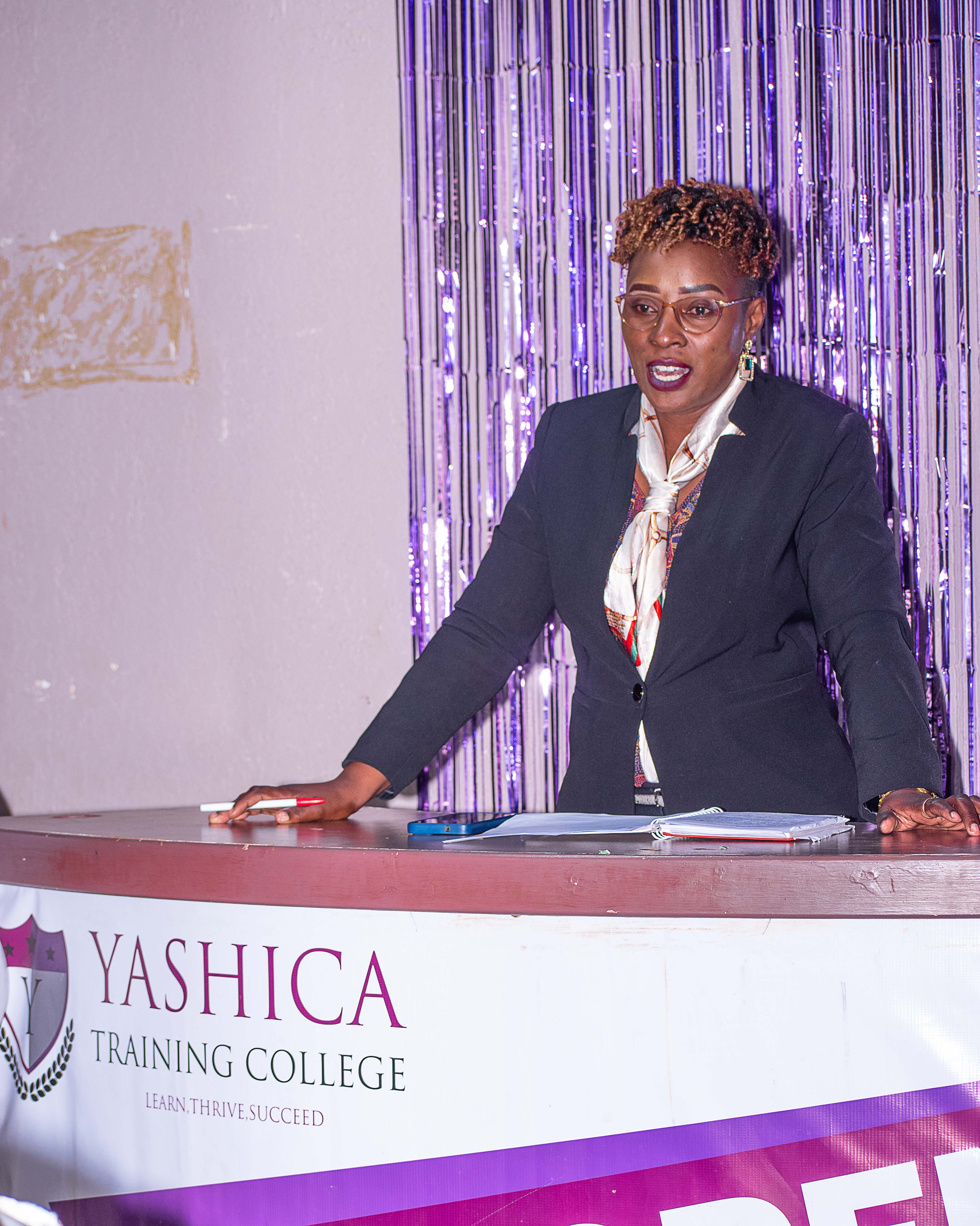 Evaline Andia - School Principal